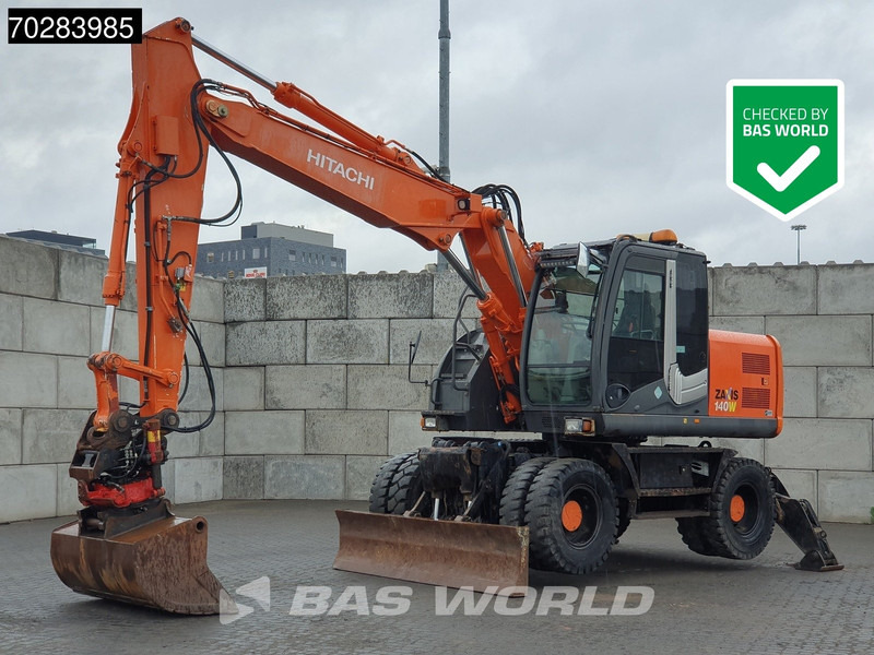 Hitachi ZX140W -3 OUTRIGGERS - ROTOTILT - Wheel excavator: picture 1 Hitachi ZX140W -3 OUTRIGGERS - ROTOTILT - Wheel excavator: picture 1