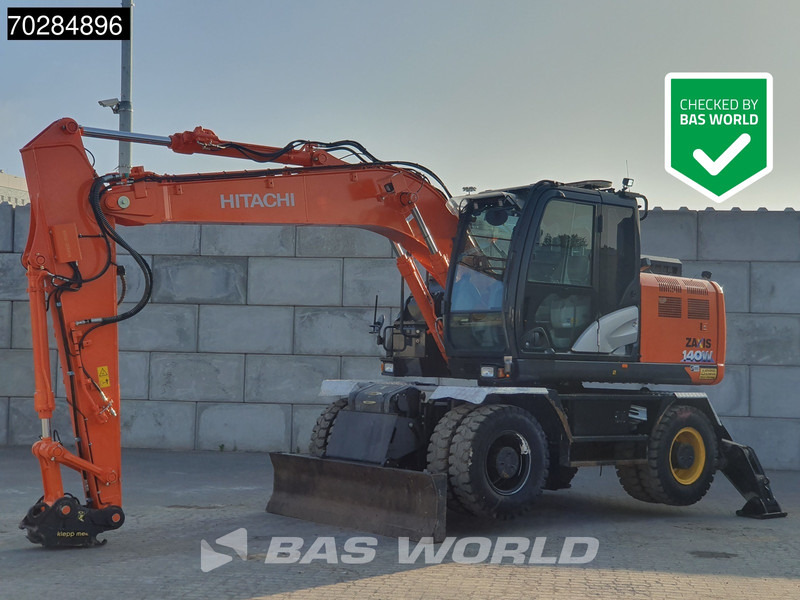 Hitachi ZX140W -6 OUTRIGGERS + BLADE - Wheel excavator: picture 1 Hitachi ZX140W -6 OUTRIGGERS + BLADE - Wheel excavator: picture 1