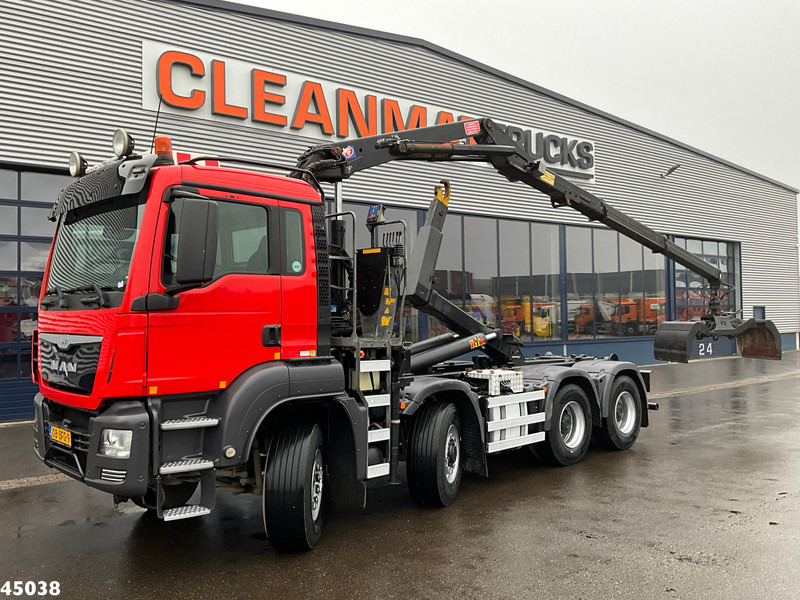 MAN TGS 35.400 8x4 Euro 6 HMF 16 Tonmeter Z-kraan - Hook lift truck, Crane truck: picture 1 MAN TGS 35.400 8x4 Euro 6 HMF 16 Tonmeter Z-kraan - Hook lift truck, Crane truck: picture 1