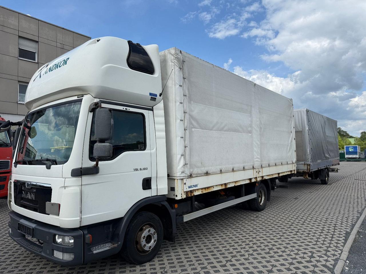 MAN TGL 8,180 Langes Haus Topsleep - Curtain side van, Combi van: picture 1 MAN TGL 8,180 Langes Haus Topsleep - Curtain side van, Combi van: picture 1