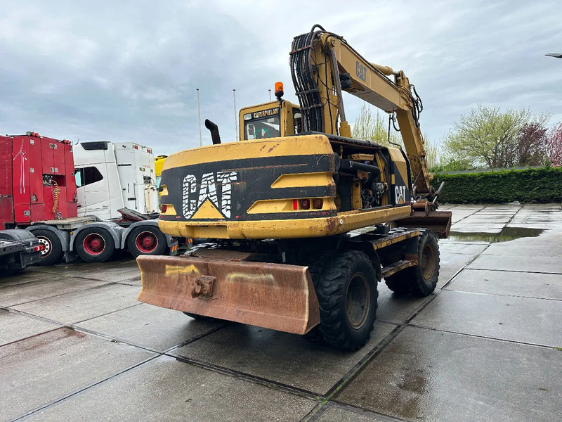 Wheel excavator Caterpillar M315 +ROTO CE: picture 6