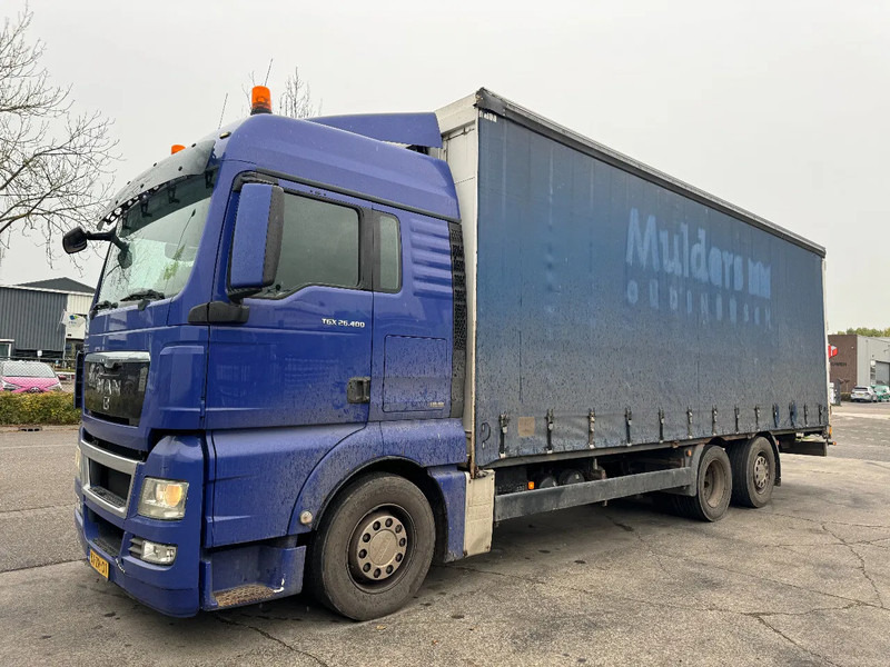 MAN TGX 26.400 6X2 - EURO 4 + LIFT + STEERING AXLE - Curtainsider truck: picture 1 MAN TGX 26.400 6X2 - EURO 4 + LIFT + STEERING AXLE - Curtainsider truck: picture 1