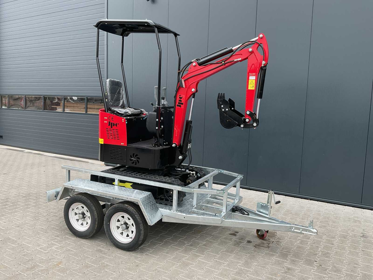 JPC HT12 met aanhangwagen - Backhoe loader: picture 1 JPC HT12 met aanhangwagen - Backhoe loader: picture 1