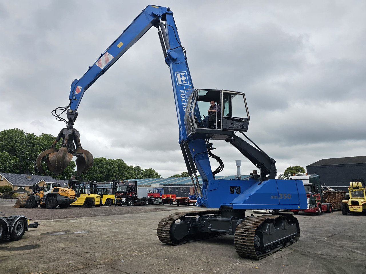 Fuchs RHL 350 Materialhandler With Adjustable Tracks - Waste/ Industry handler: picture 1 Fuchs RHL 350 Materialhandler With Adjustable Tracks - Waste/ Industry handler: picture 1