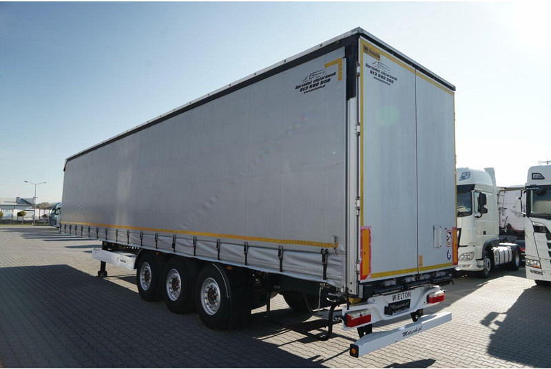 Wielton FIRANKA / STANDARD / OŚ PODNOSZONA / DACH PODNOSZONY / SAF - Curtainsider semi-trailer: picture 5 Wielton FIRANKA / STANDARD / OŚ PODNOSZONA / DACH PODNOSZONY / SAF - Curtainsider semi-trailer: picture 5