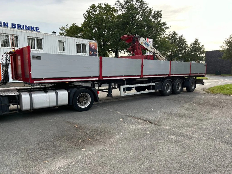 Carnehl Stenen vervoer oplegger met Kennis kraan - Dropside/ Flatbed semi-trailer: picture 1 Carnehl Stenen vervoer oplegger met Kennis kraan - Dropside/ Flatbed semi-trailer: picture 1