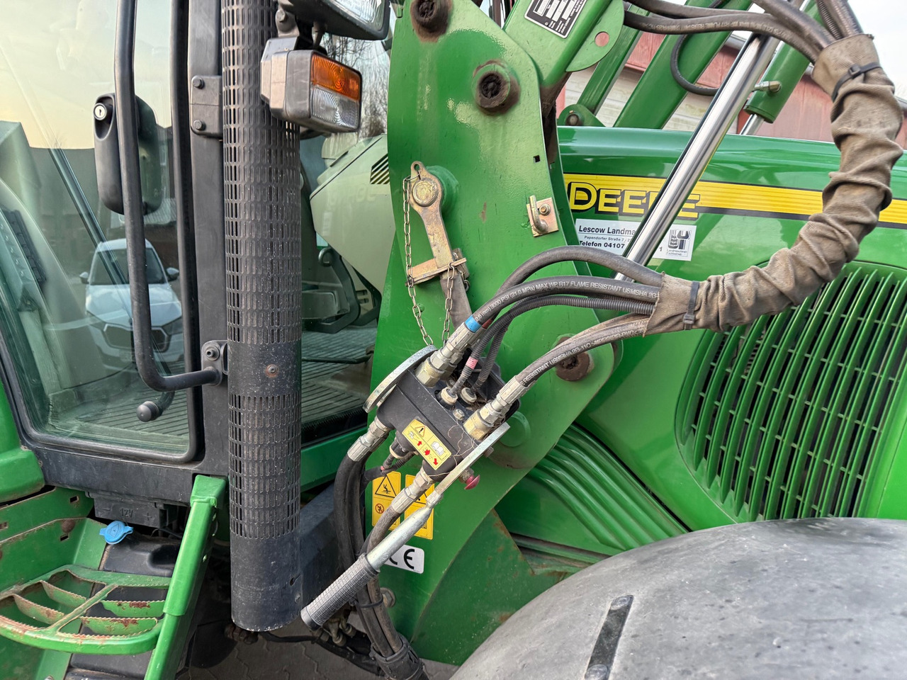 Farm tractor John Deere 6420: picture 19