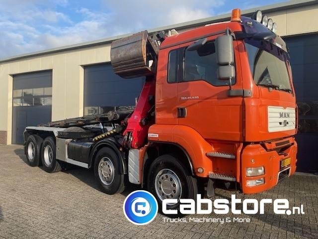 MAN TGA 41.440 8X4 BB Palfinger Epsilon Z-Kraan bouwjaar 2011 + NCH 30 Ton's Kabel-containersyteem - Handgeschakeld - Bouwjaar 2007 - Km 582.782 - Cable system truck, Crane truck: picture 1 MAN TGA 41.440 8X4 BB Palfinger Epsilon Z-Kraan bouwjaar 2011 + NCH 30 Ton's Kabel-containersyteem - Handgeschakeld - Bouwjaar 2007 - Km 582.782 - Cable system truck, Crane truck: picture 1