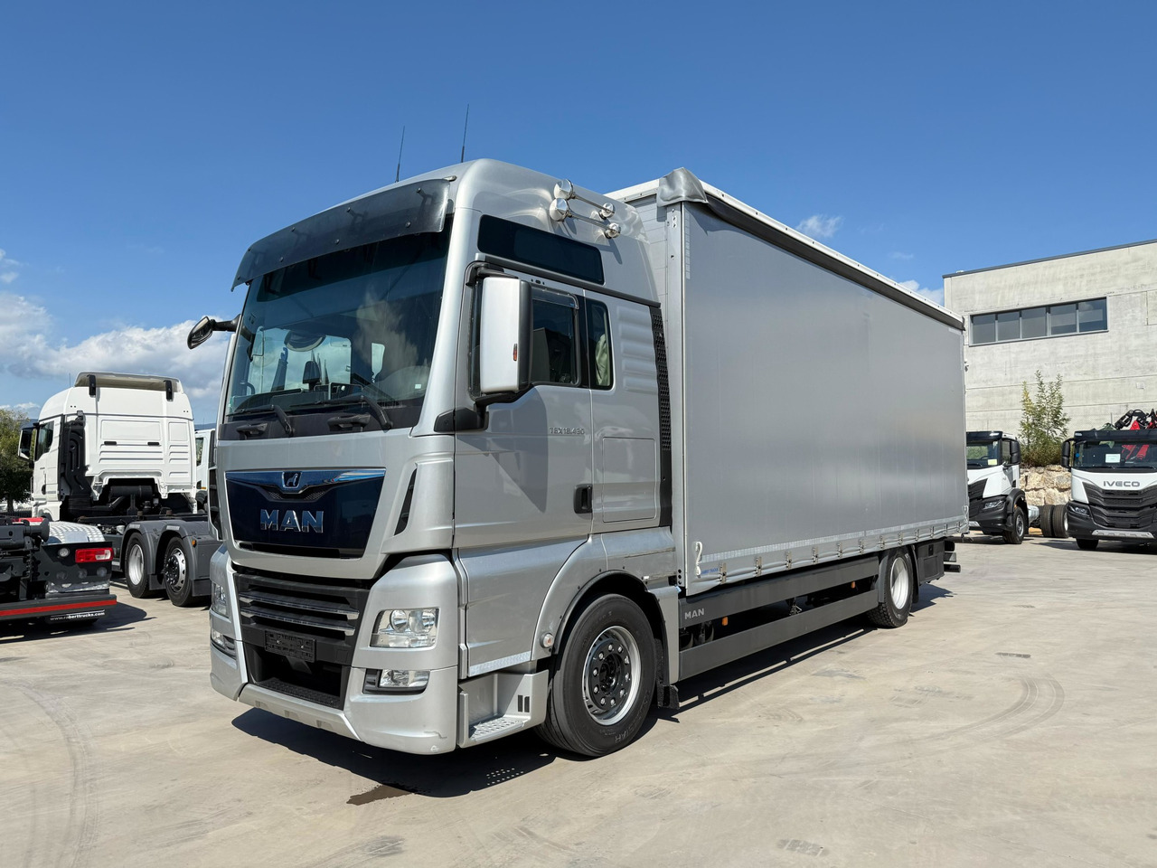 MAN 18.430 LL TGX E6 (Tauliner) - Curtainsider truck: picture 1 MAN 18.430 LL TGX E6 (Tauliner) - Curtainsider truck: picture 1