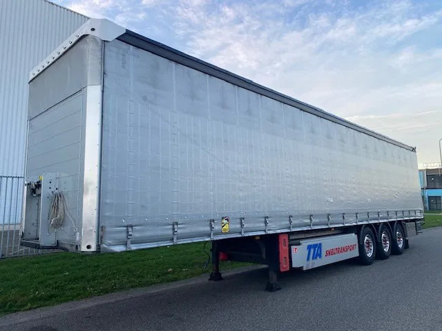 Schmitz Cargobull SCB ,schuifzeil/dak met onderschuifklep ,alcoa , kisten en veiligheidszeil. - Curtainsider semi-trailer: picture 1 Schmitz Cargobull SCB ,schuifzeil/dak met onderschuifklep ,alcoa , kisten en veiligheidszeil. - Curtainsider semi-trailer: picture 1